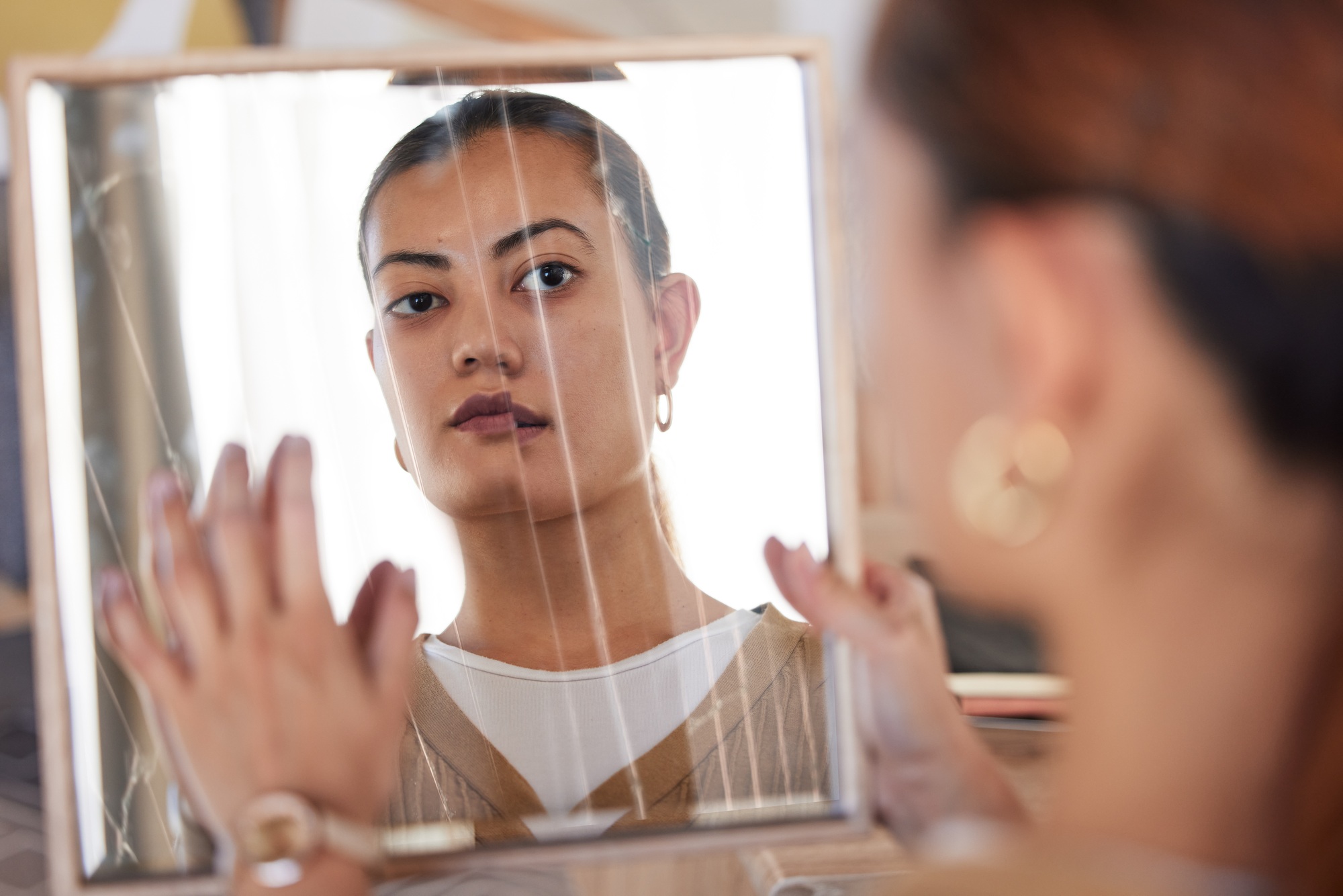 Broken mirror, bipolar woman and reflection of anxiety, depression or psychology, identity crisis o